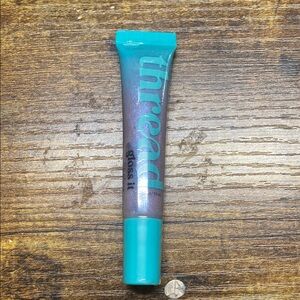 Thread Gloss Lip Gloss in Teal and Purple